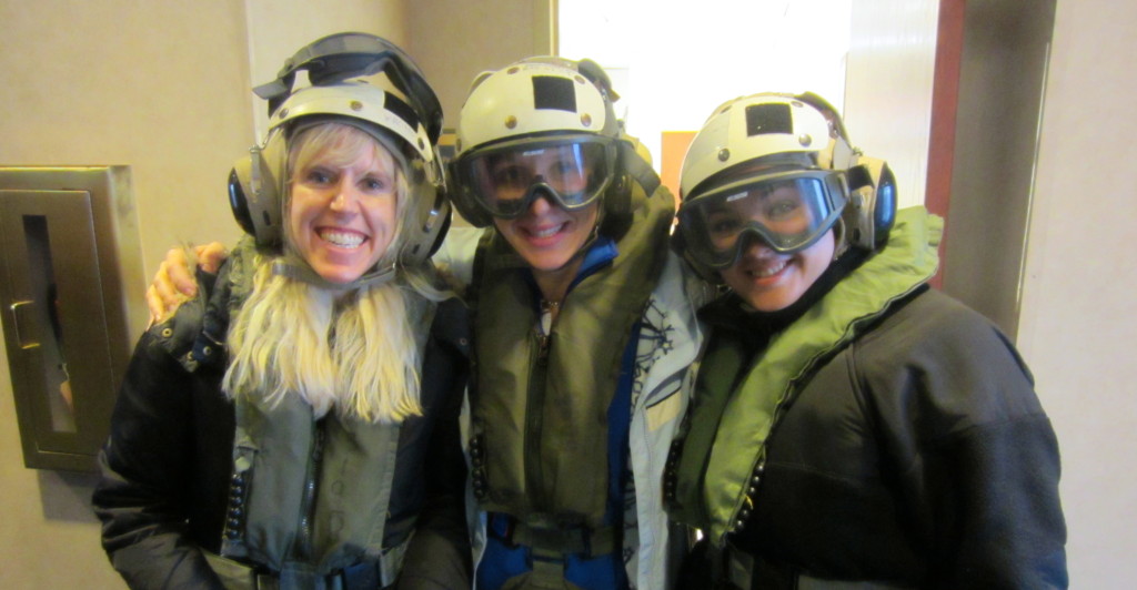 Bethany (middle) with other White House Fellows preparing to board a military flight to an aircraft carrier 
