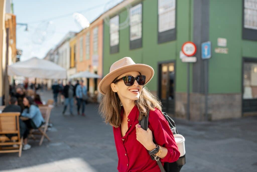 Young female graduate student strolling the streets in Europe and taking in the sites during her Fulbright U.S. Student Study/Research Grant.