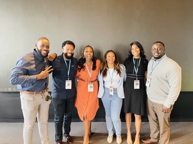Six HBCUvc Fellows, including Nyland Sidifall, smile at camera at a Silicon Valley Meeting