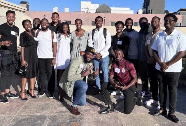 HBCUvc Fellows gathered in semi-circle smiling at camera 