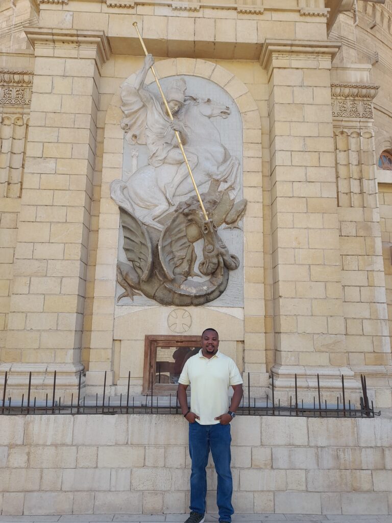 Terik Tidwell standing in font of monument in Egypt