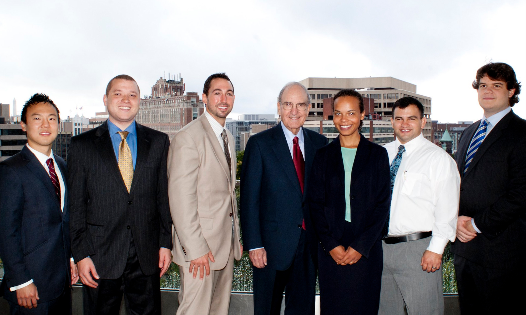 YJ Heo, Mitchell Scholar, and his cohort of George Mitchell Scholars meet Senator George Mitchell, who played a leading role in negotiating peace in Northern Ireland.