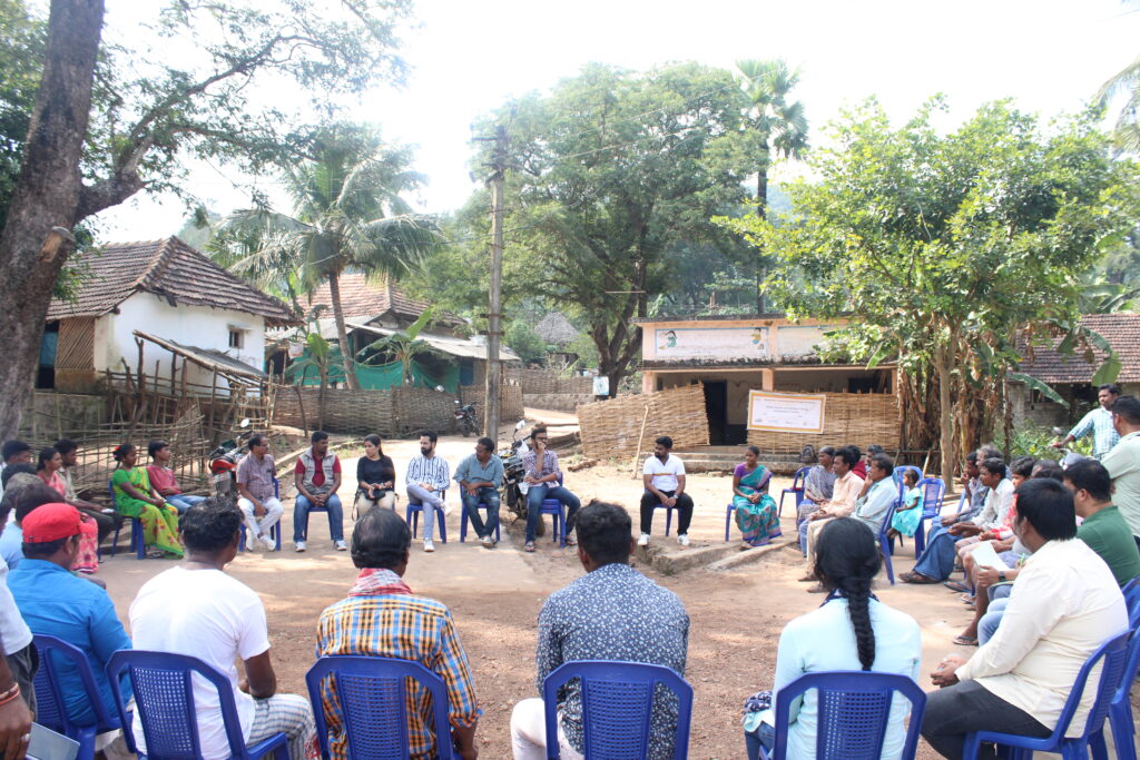 Dr. Benny Katta meeting with a local community to discuss how to achieve sustainable farming at scale.