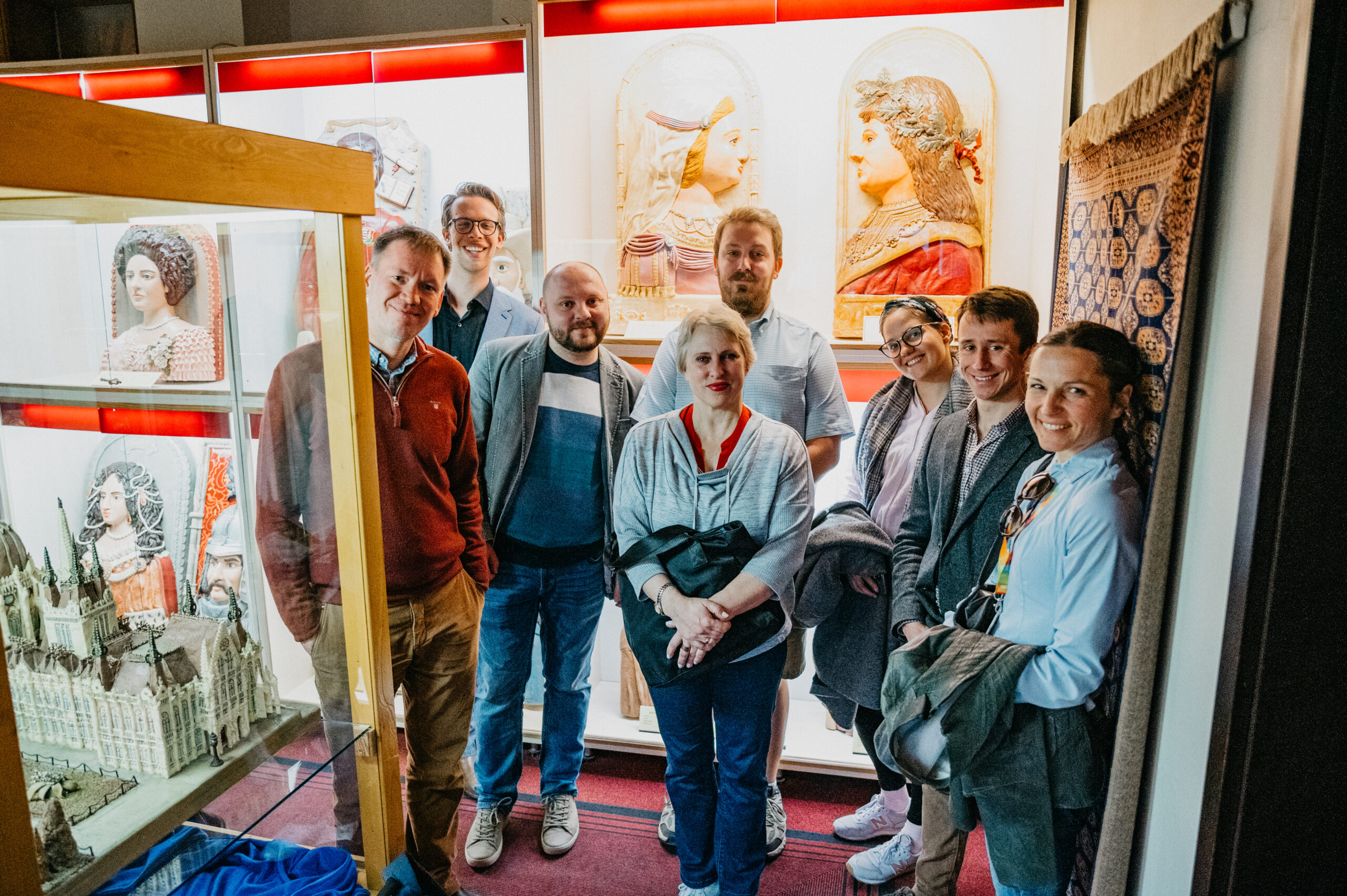 Kelli Buzzard, Budapest Fellow, posing for a picture with her cohort of Budapest Fellows at a museum in Budapest Hungary.