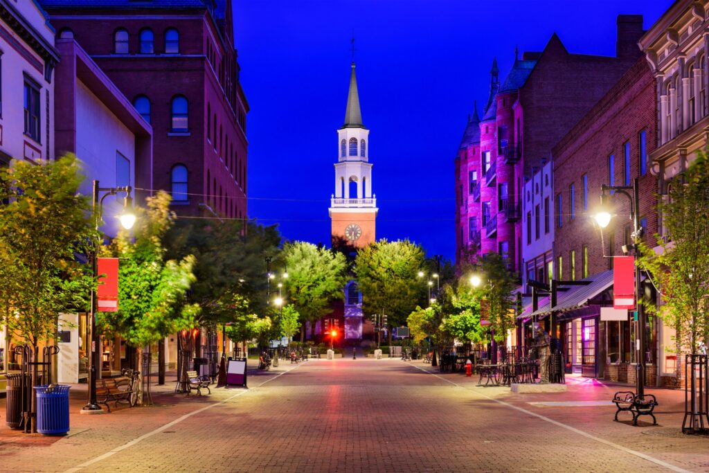 A view of Church Street Marketplace lit up by street lights at night. Burlington, Vermont, USA.