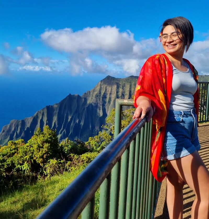 Natalia Fareti standing on a lookout on Kauai while on her Professional Fellows Program for Young Economic Empowerment Leaders Fellowship in 2023.