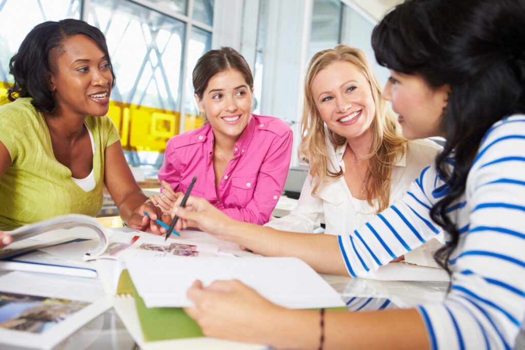 Group of women meeting to discuss fellowship opportunities and create an application plan.