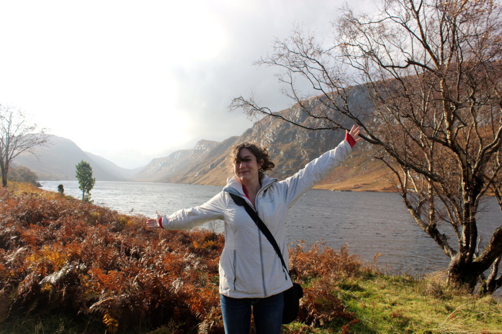 Meghan standing in front of a river
