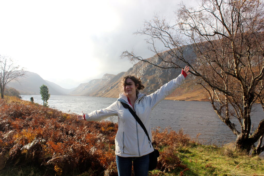 Meghan standing in front of a river