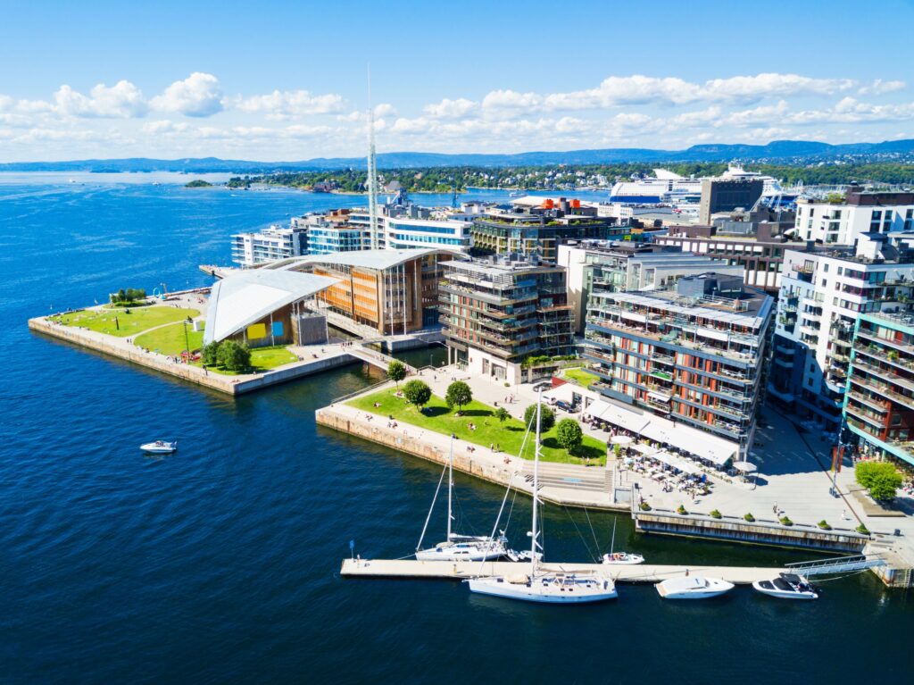 Oslo harbor or harbor at the Aker Brygge neighbourhood in Oslo. Oslo is the capital of Norway. This image is representative of am upcoming fellowship deadline for an opportunity in Norway.