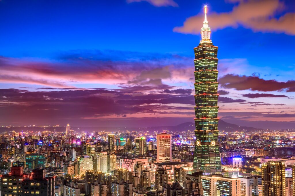 City skyline of Taiwan against a purple, pink and blue sky, which is offering 2 new Fulbright awards for this application cycle.